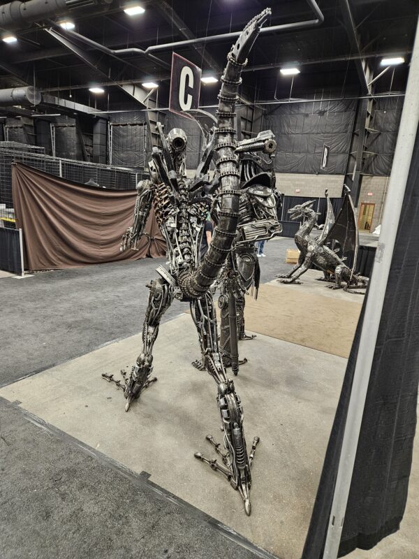 Life Sized Alien-inspired metal sculpture