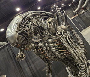 Life Sized Alien-inspired metal sculpture
